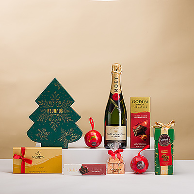 Pour que Noël 2024 soit le plus joyeux possible, cette édition spéciale de Noël de notre best-seller Chocoholic Deluxe est accompagnée du luxueux champagne Moët & Chandon!