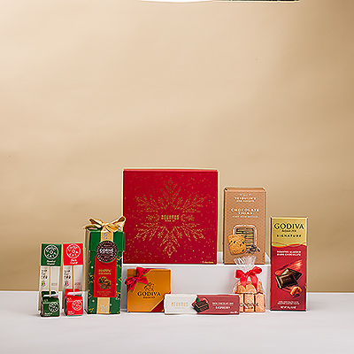 Faites plaisir à votre amateur de chocolat préféré avec cette édition spéciale de Noël de notre best-seller Chocoholic Deluxe! La généreuse collection de chocolats de Noël de grandes marques telles que Neuhaus, Godiva et Corné Port-Royal est plus que suffisante pour être partagée avec toute la famille ou le bureau.